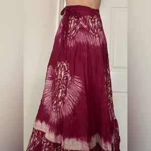 Floor length deep red wrap skirt with beautiful white pattern
